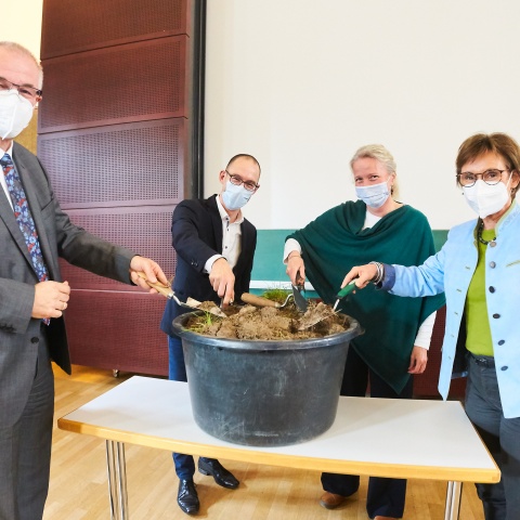 The symbolic groundbreaking ceremony for the new environmental technology center took place in the lecture hall. 