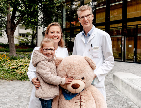 Familie mit Teddy