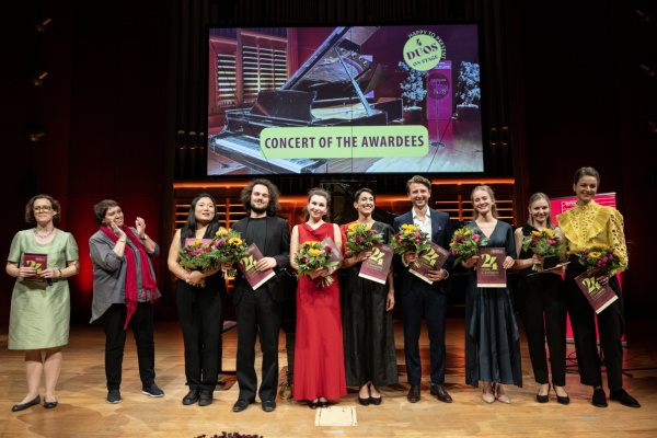 The prizewinners in a group photo.